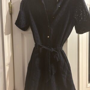 Navy Draper James short sleeve romper with tie waist.